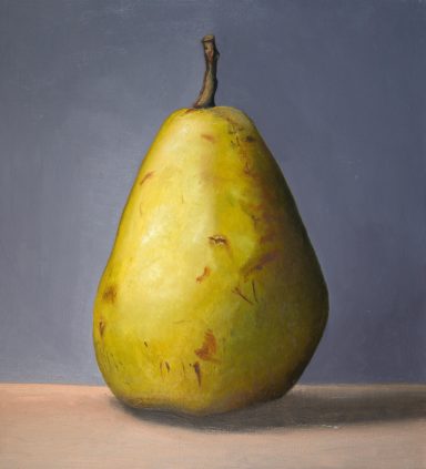 A single yellow pear with a textured surface against a gray backdrop.